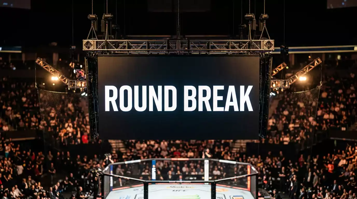 Round timer display at the UFC octagon showing the one-minute between-rounds break window